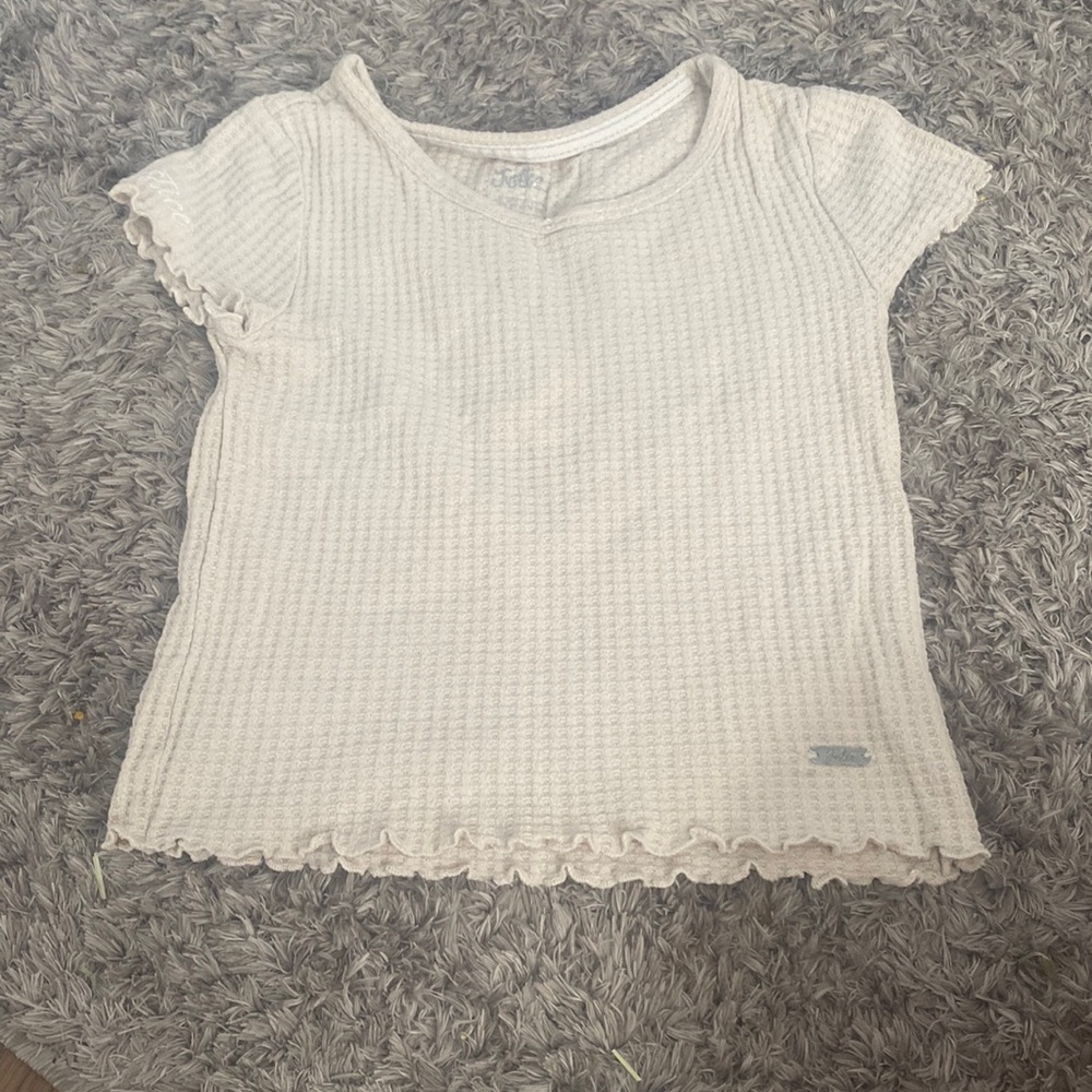 Justice top! Preferably for 8 year olds.